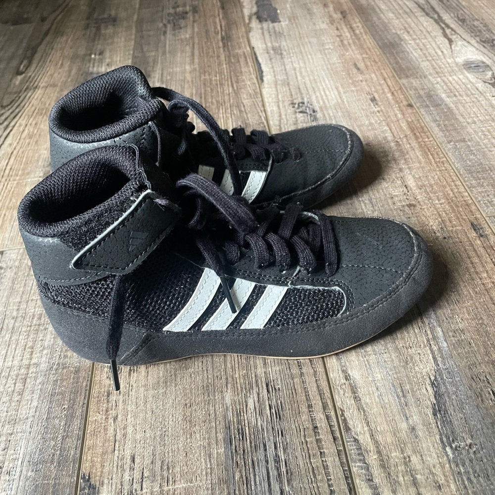Adidas Black and White kids wrestling shoes.